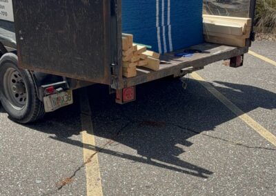Southwest Removal team completing a commercial board-up project for a shopping center.